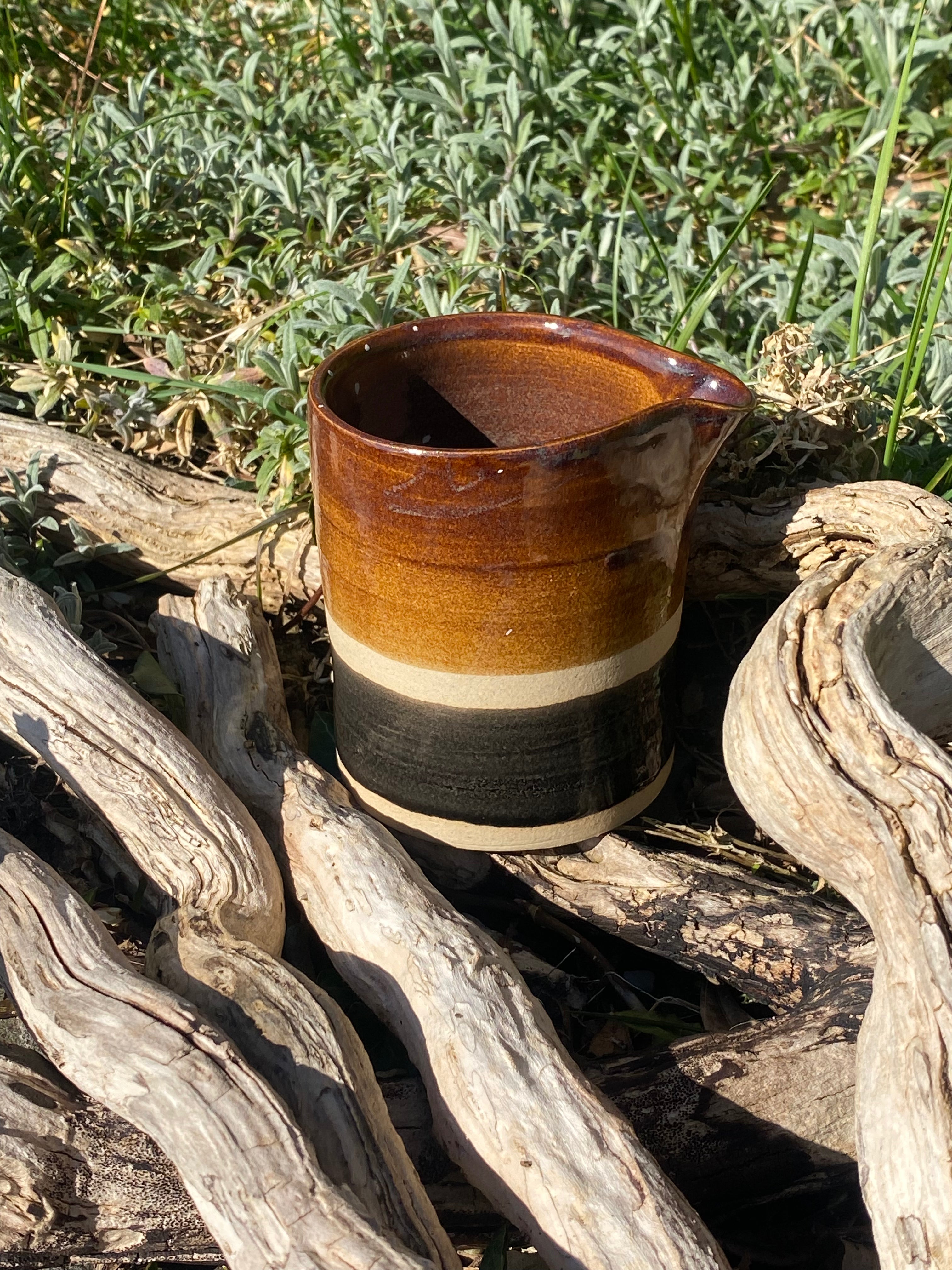 Small brown jug — hand-thrown warmth for everyday rituals