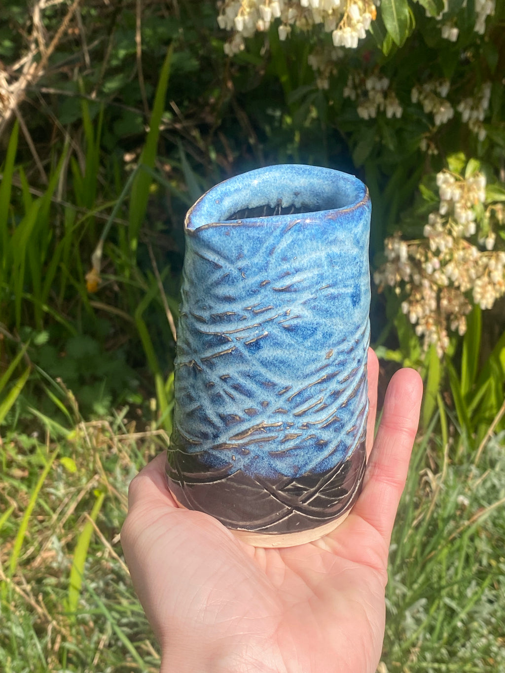 Blue Jug — hand-thrown stoneware with ocean-blue charm