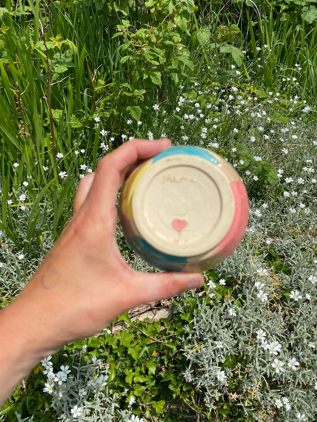 Soft focus, candy colors, textured vessel, planter, sauce bowl.